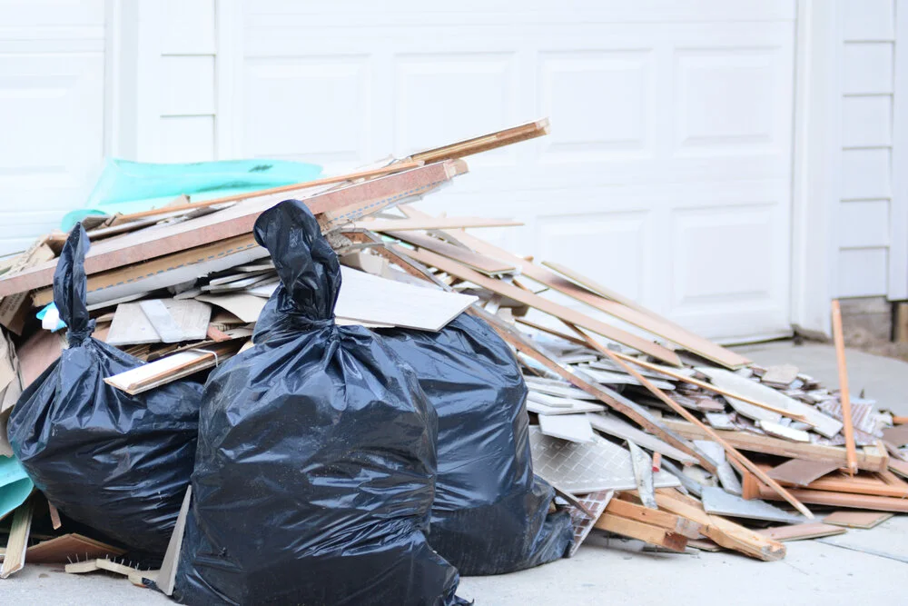 Junk removal debris including construction materials and household items in Vancouver