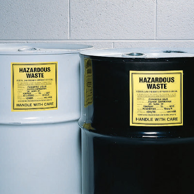 Aerosol can with hazard warning symbols